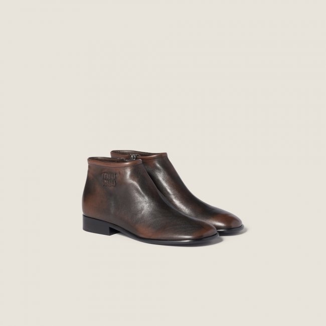 Miu Miu Fumé leather booties Dark Brown