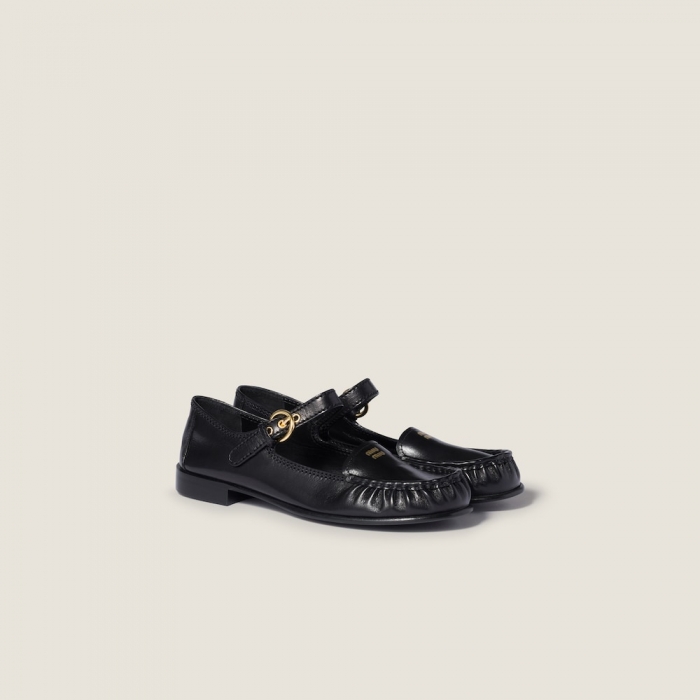 Miu Miu Leather loafers with strap Black