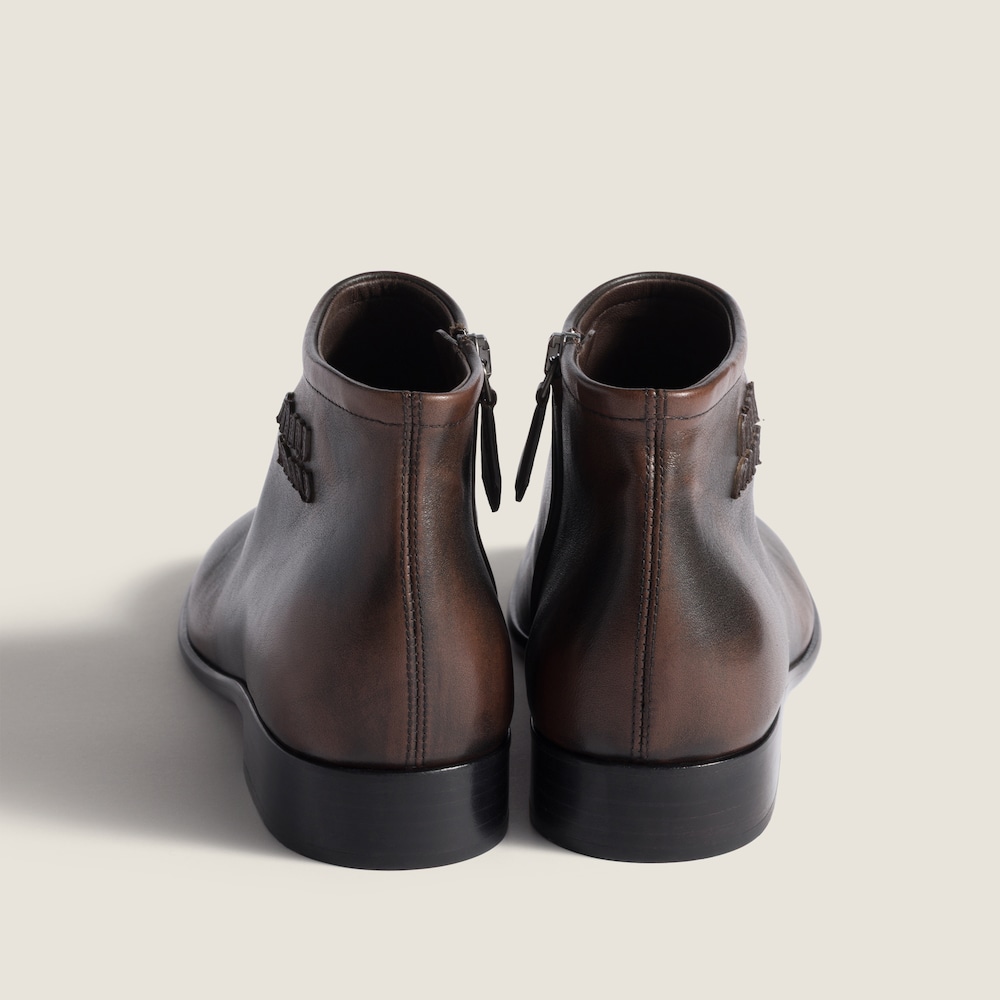 Miu Miu Fumé leather booties Dark Brown