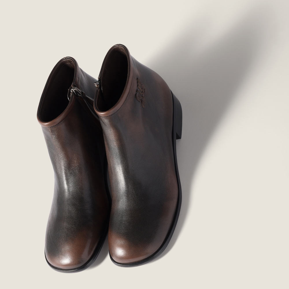 Miu Miu Fumé leather booties Dark Brown