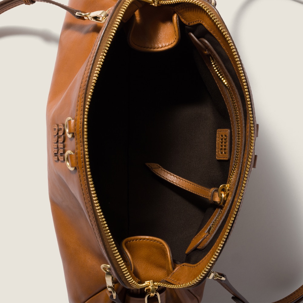 Miu Miu Caprice leather clutch Cognac