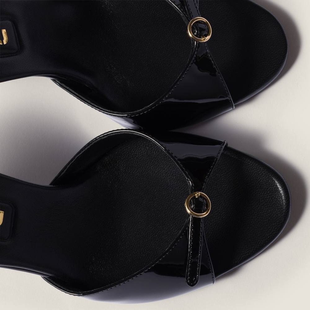 Miu Miu Patent leather mules with buckle Black