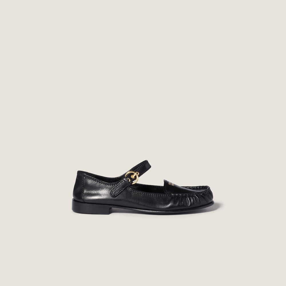 Miu Miu Leather loafers with strap Black
