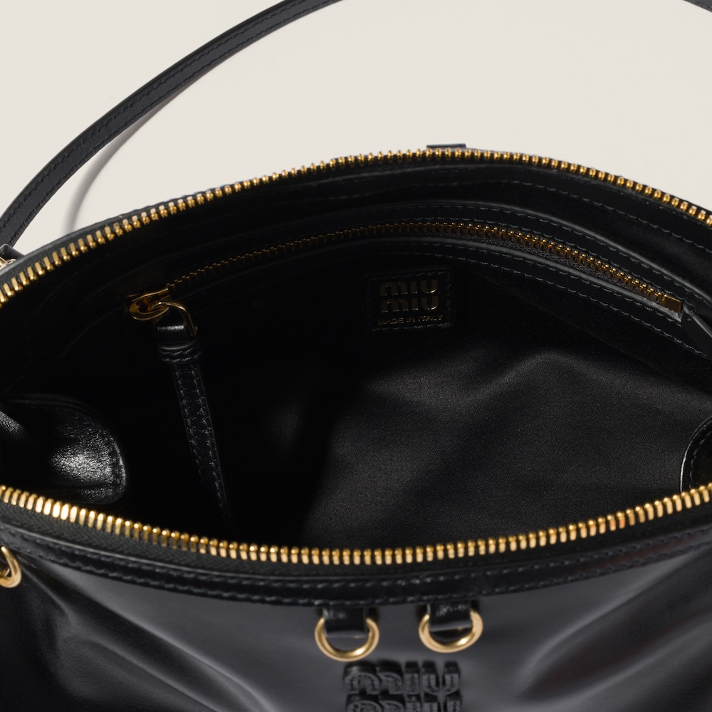 Miu Miu Caprice shiny leather clutch Black
