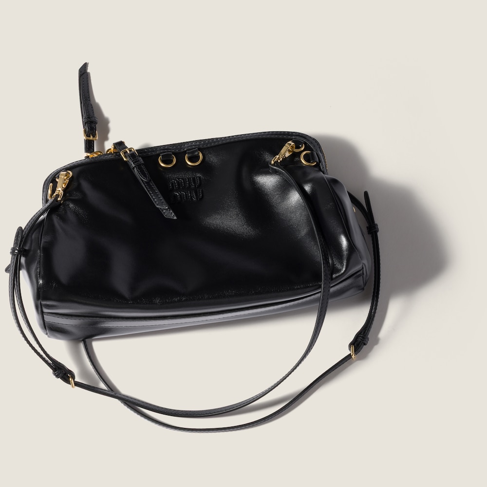 Miu Miu Caprice shiny leather clutch Black