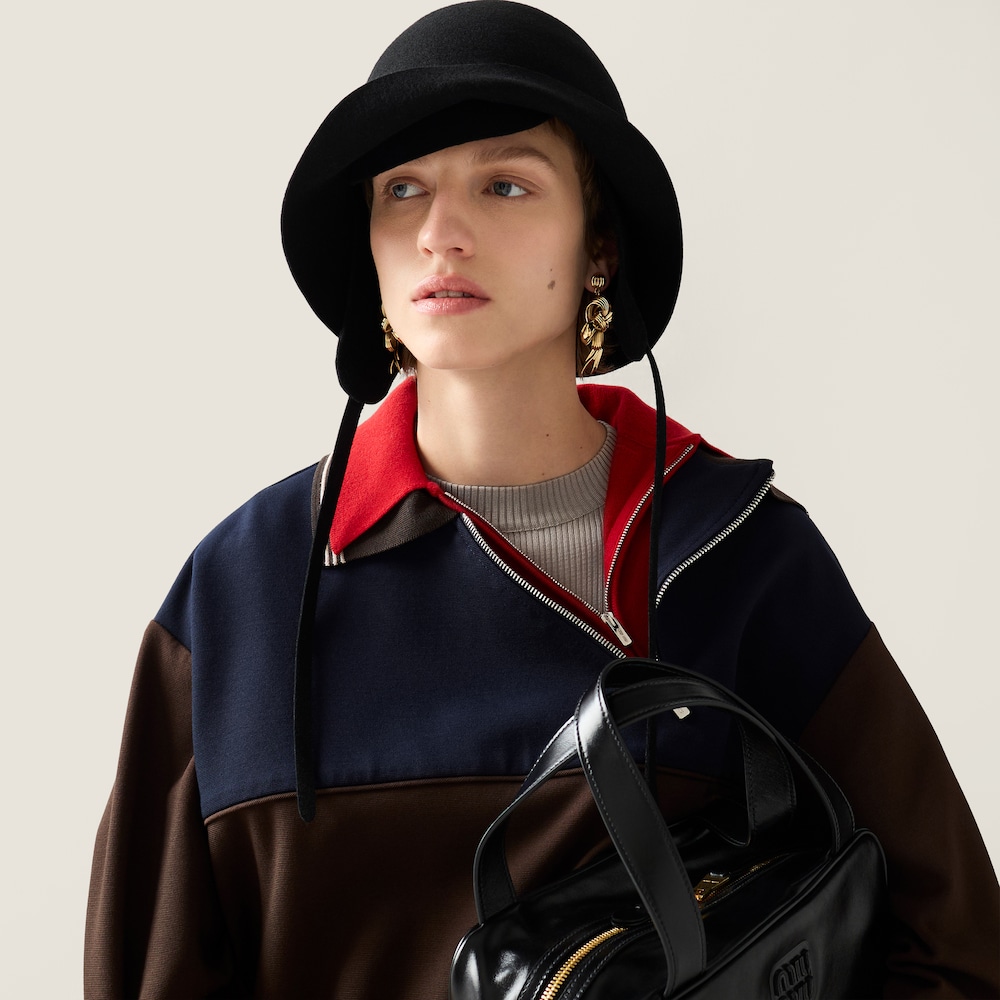 Miu Miu Metal bow earrings Gold