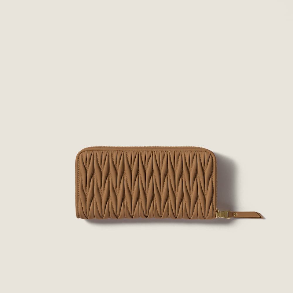 Miu Miu Large matelassé nappa leather wallet Caramel