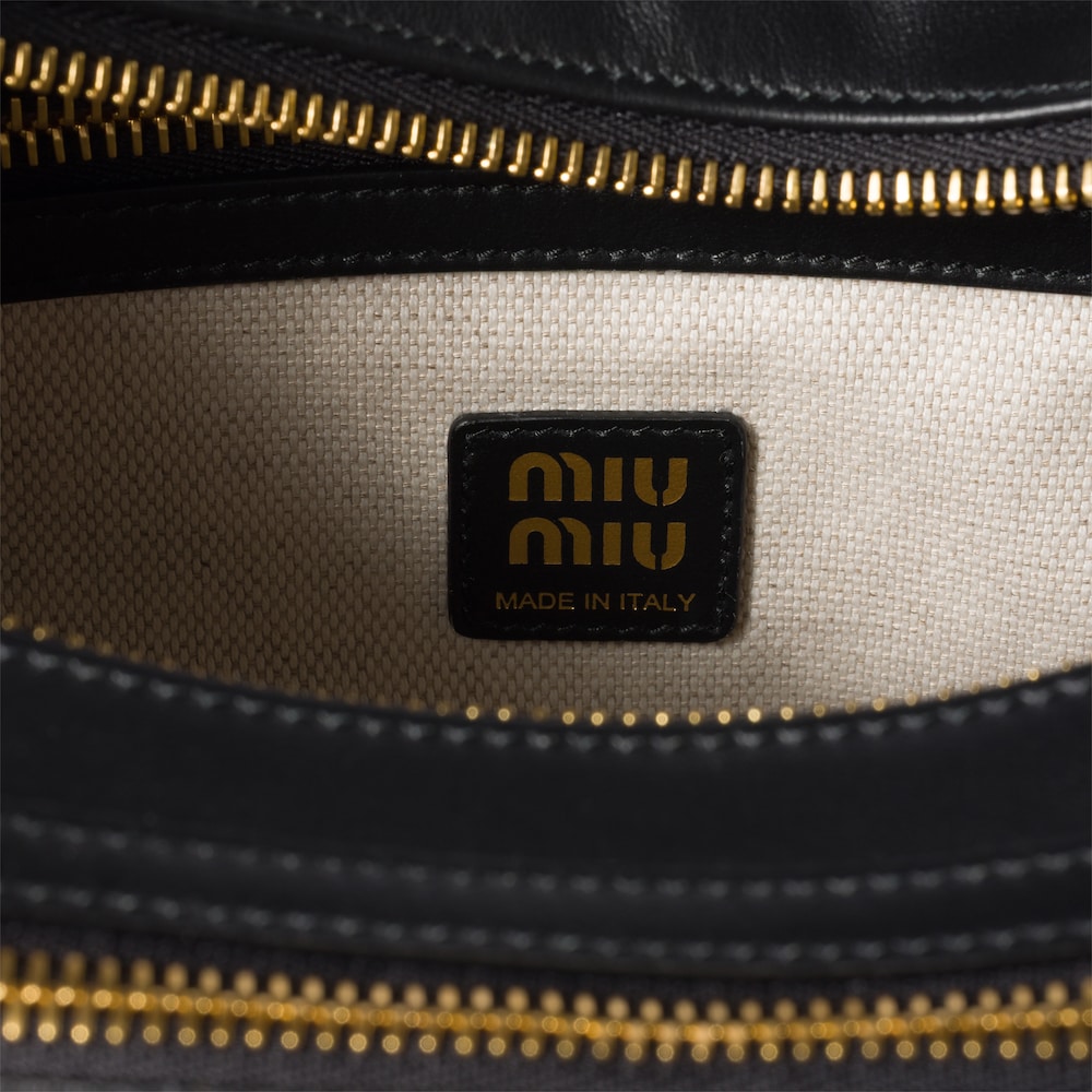Miu Miu Pocket leather bag Black