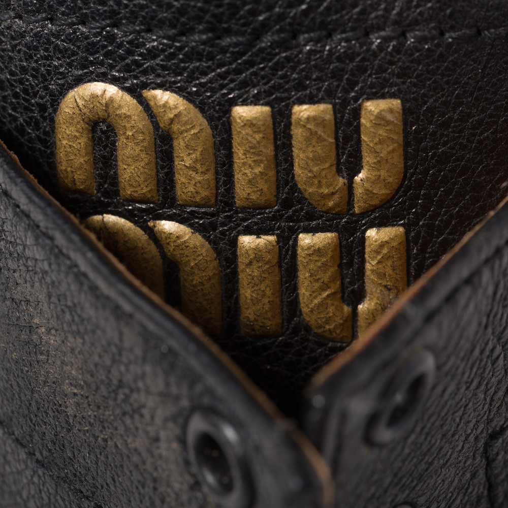 Miu Miu Leather laced booties Black